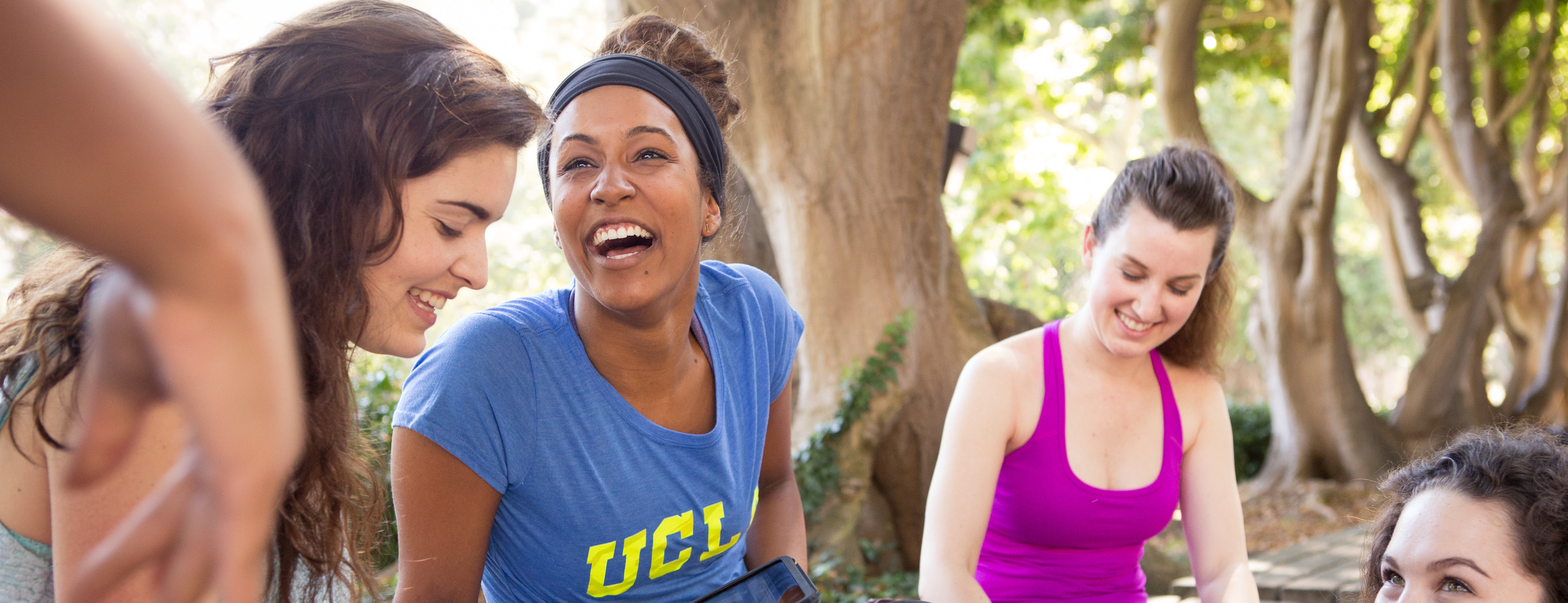 Photo of students laughing outside
